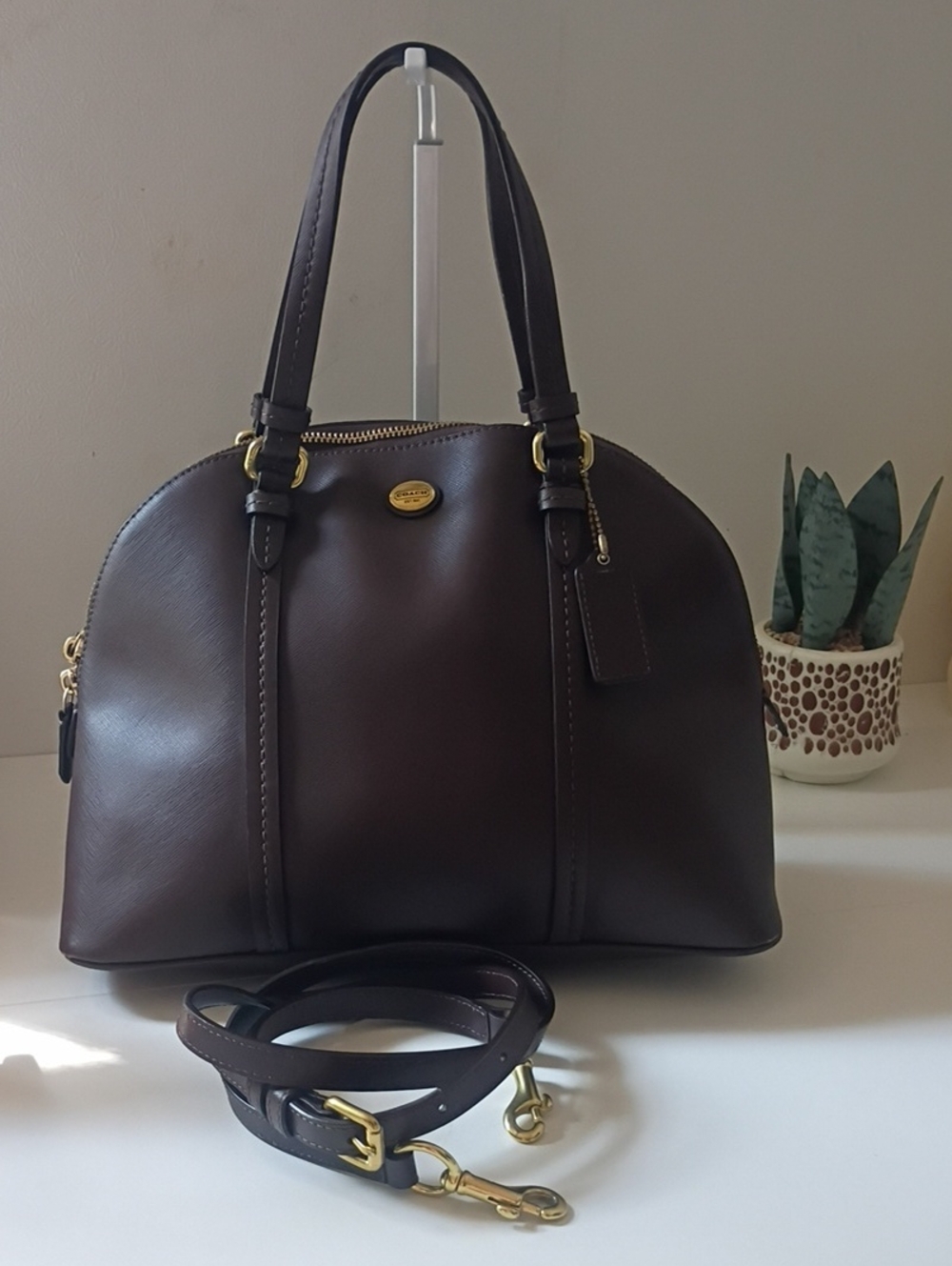 Coach Peyton Leather Cora Domed Satchel in a dark brown mahogany color F25671